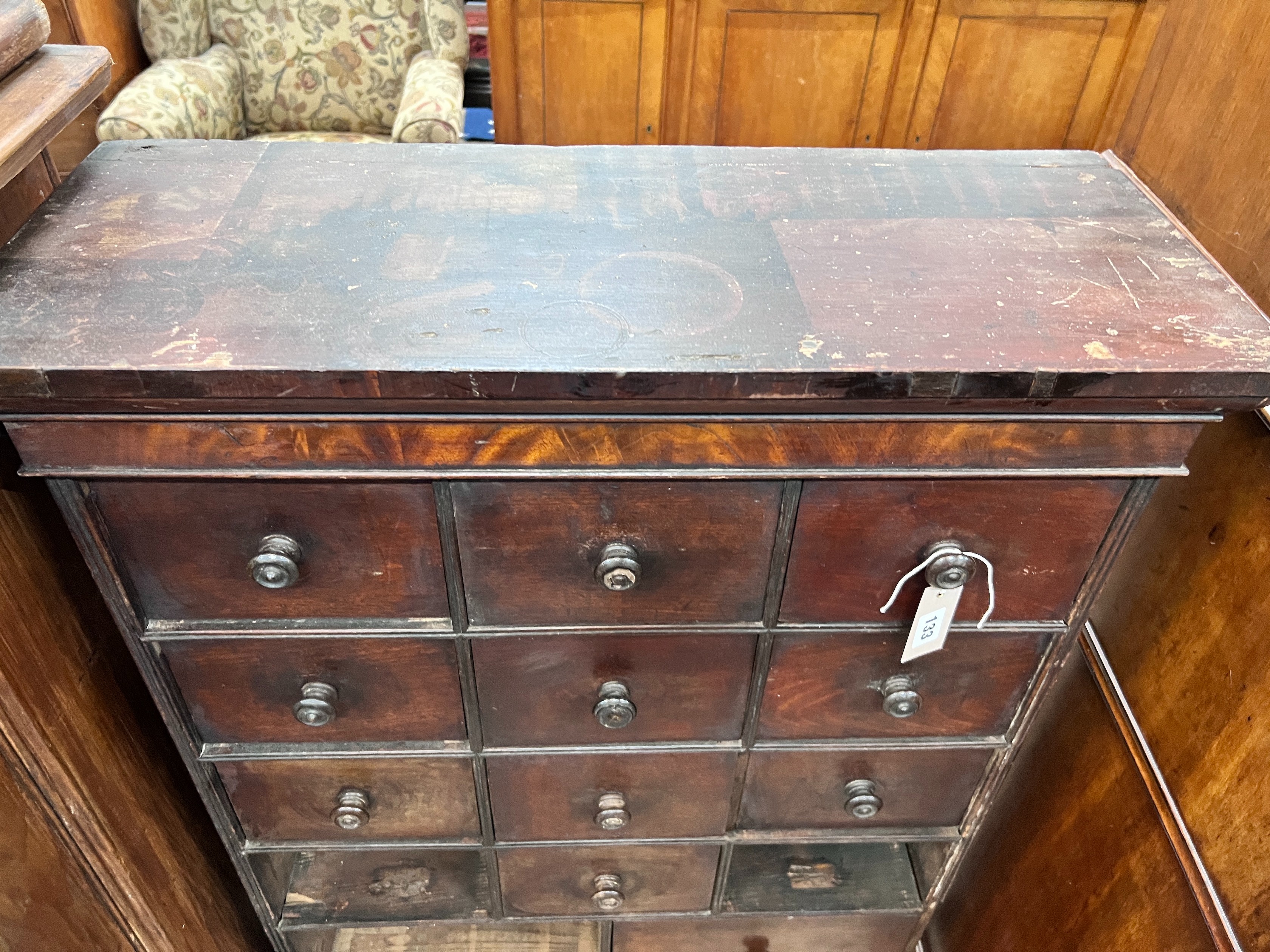 A collector's chest (missing three drawers), width 70cm, depth 28cm, height 116cm *Please note the sale commences at 9am.